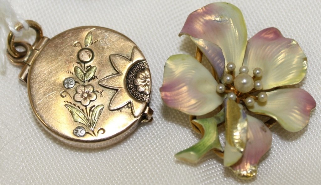 ART NOUVEAU 14K GOLD, ENAMEL AND PEARL FLORAL: BROOCH, SOME ENAMEL MISSING, ALONG WITH AN AESTHETIC MOVEMENT GOLD LOCKET. BROOCH MEASURES 1 1/4", 5.2 DWT. LOCKET HAS FLORAL DECORATION ON FRONT, A MONOGRAM ON BACK AND IT MEASURES 3/4" D. THE LOCKET