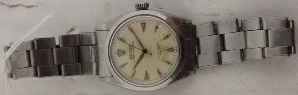 VINTAGE ROLEX STAINLESS STEEL WRIST WATCH, OYSTER: PERPETUAL MOVEMENT, 1 3/16" DIAL.