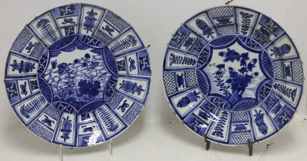 2 SIMILAR EARLY CHINESE EXPORT PLATES, POSSIBLY: 18TH C , 10 1/2" DIAMETER, GEOMETRIC AND FLORAL DESIGN. 1 SHOWS A 2" HAIRLINE CRACK TO BORDER.