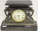 ORNATE VICTORIAN IRON MANTEL CLOCK WITH WINGED