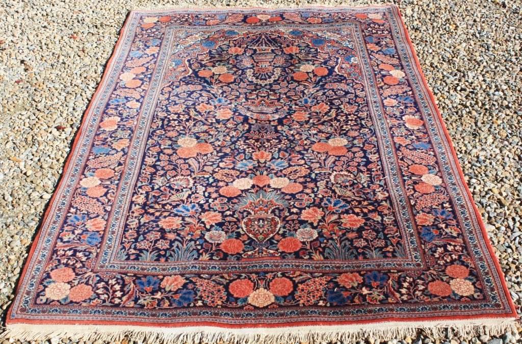 FINELY WOVEN PERSIAN CARPET, CA 1930, POSSIBLY: TABRIZ. FLORAL DESIGN WITH BIRDS, URNS AND AN UNUSUAL CROWN IN CENTER. 4' 4" X 6' 8".