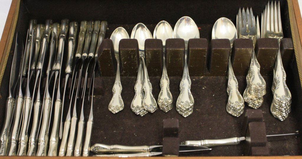 74 PIECE STERLING SILVER FLATWARE SET, SERVICE: FOR 12 BY TOWLE IN THE DEBUSSY PATTERN, 1959 TO INCLUDE 6" TEASPOONS, 6 1/2" SOUP SPOONS, 7 1/2" DINNER FORKS, 6 5/8" SALAD FORKS, 9 3/4" DINNER KNIVES, 6 1/2" BUTTER KNIVES. NO MONOGRAMS 81.72 TROY O