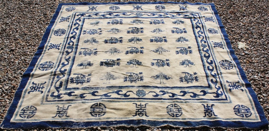 EARLY 20TH C CHINESE SCATTER RUG, UNUSUAL ALMOST: SQUARE SIZE 6' X 5' 10". SHOWS SEVERAL AREAS OF MODERATE WEAR.