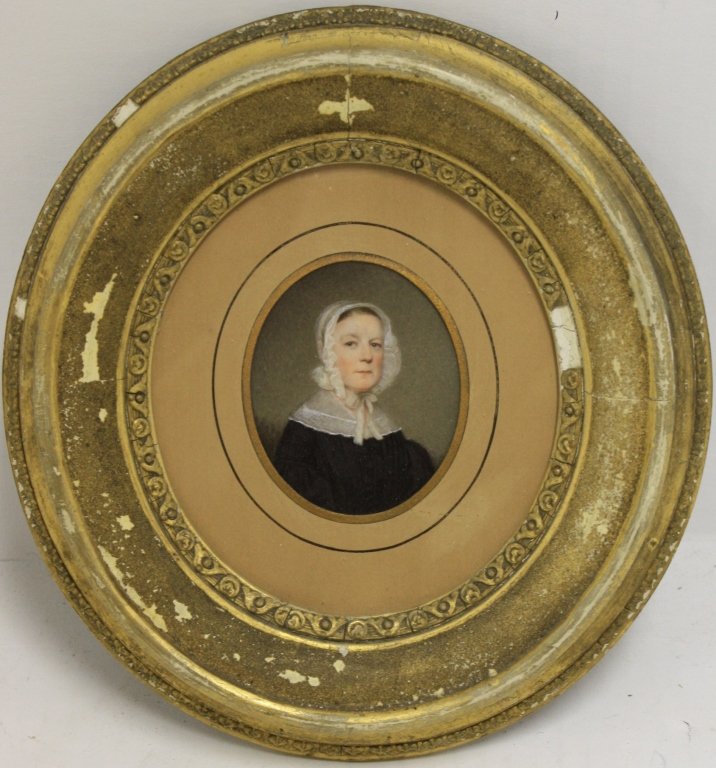 EARLY 19TH C MINIATURE PORTRAIT OF A WOMAN IN A: PERIOD OVAL FRAME, NOT SIGNED. FRAME SHOWS SOME GILT LOSS. 3" HIGH X 2 1/2" OVAL.