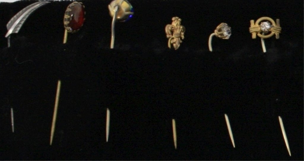 18 VICTORIAN STICK PINS. MOST ARE GOLD FILLED: TO INCLUDE CRAB WITH PEARL, WALKING STICK, CRESCENT MOON, ETC.