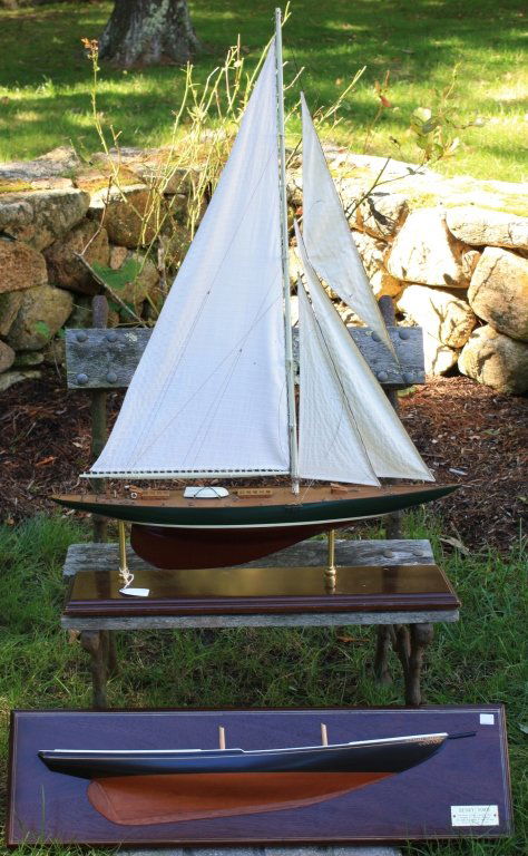 TWO 20TH C SHIP MODELS TO INCLUDE A HALF HULL: OF THE HENRY FORD, A GLOUCESTER FISHING SCHOONER, 1922, 8 1/2" HIGH X 31 3/4" LONG. ALONG WITH A MODEL OF A UNIDENTIFIED SCHOONER WITH RIGGING AND SAILS ON CUSTOM MAHOGANY STAND. 35" HIGH X 24 1/2" WI