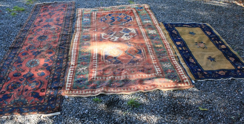 3 ANTIQUE ORIENTAL RUGS TO INCLUDE A 1920'S: CHINESE SCATTER RUG, BEIGE FIELD WITH BLUE BORDER, 31 1/2" X 55". A WORN LATE 19TH C KAZAK WITH TEARS, 50 1/2" X 91". AND A PERSIAN RUNNER 31 1/2" X 113", OVERALL WORN CONDITION AND LOSS TO BORDER AT 