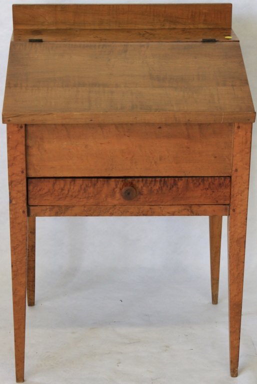 EARLY 19TH C BIRDS EYE AND TIGER MAPLE SLANT-FRONT: DESK WITH FITTED INTERIOR AND 1 DRAWER, TAPERED LEGS. LID IS AN OLD REPLACEMENT. REFINISHED. 37 1/4" HIGH, 24 1/2" WIDE, 19" DEEP.