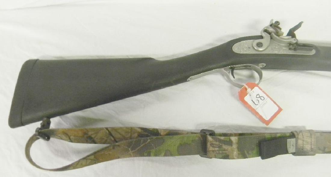 Thompson Center Arms Fire Storm .50 Cal Black Powder: Thompson Center Arms Fire Storm .50 Cal Black Powder Rifle (#S21688)Stainless Steel, Black Synthetic Stock & Black Rubber Butt, Flintlock Muzzleloader 26" barrel