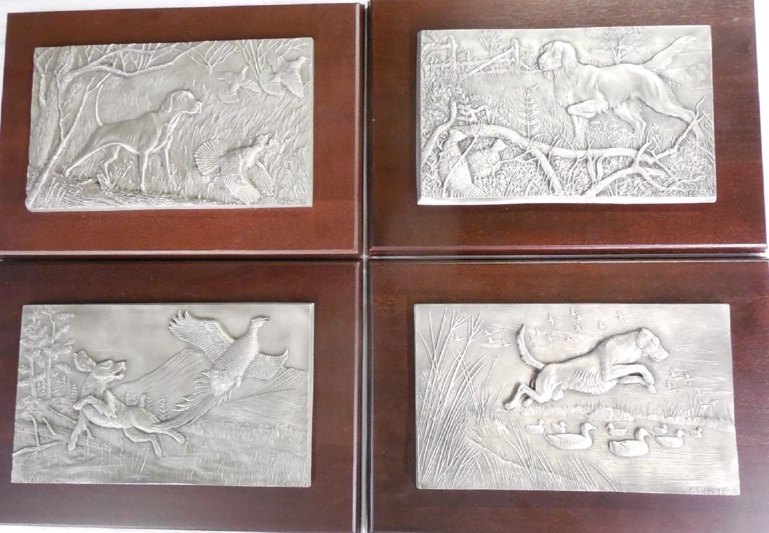 4 Franklin Mint Hunting Dog Pewter Wall Art Pieces by: This is the complete set of (4) pewter hunting dog wall plaques by the Franklin Mint. The pieces have been removed from the original plastic but they have never been displayed. Each piece is signed by