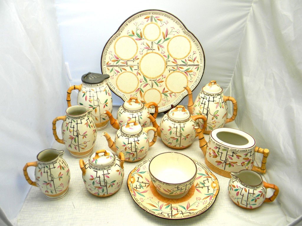 Group of Brownhills Pottery Co. 9 1/2" Pewter Top: Group of Brownhills Pottery Co. 9 1/2" Pewter Top Pitcher, 4 1/2" Teapot (no lid), 5 3/4" Teapot,10 1/4" Serving Platter, 5 1/2" Syrup, 6 3/4" Syrup, (2) 6 1/2" Teapots, 5 1/2" Sugar Bowl, 8 1/2"Coffe