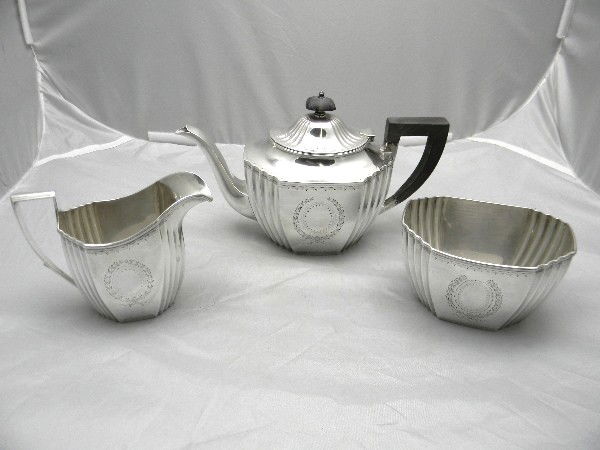 Black Starr & Frost Sterling 3pc Tea Set includes: Black Starr & Frost Sterling 3pc Tea Set includes 2 1/2 pint Tea Pot 19.5ozt, Cream Pitcher 8.25ozt, Open Sugar 7.8ozt total 35.5ozt (includes ebony handle and finial)