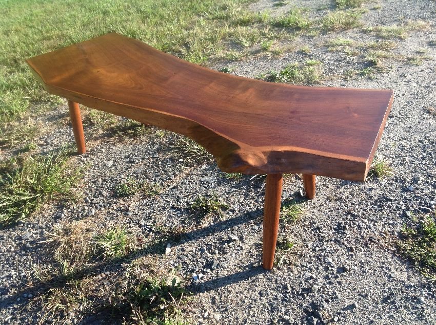 Free Form Nakashima Style Plank Walnut Coffee Table: Free form Nakashima Style free form plank coffee table standing 17" high and measuring 61" long by 19" wide.