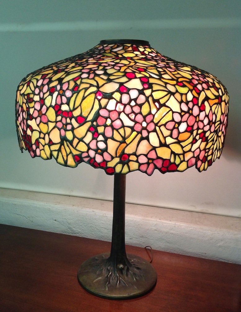 Fine Reproduction, Tiffany Studios Table Lamp: Large floral shade. Shade diameter 22", 10" Treetrunk base. Overall height 27".