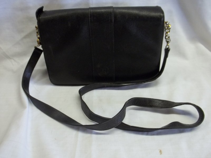 Black Leather Fendi Purse Shoulder Bag Handbag: Fendi purse/handbag in black leather. Gold tone chain connects strap 7" H x 10" W --48" long strap