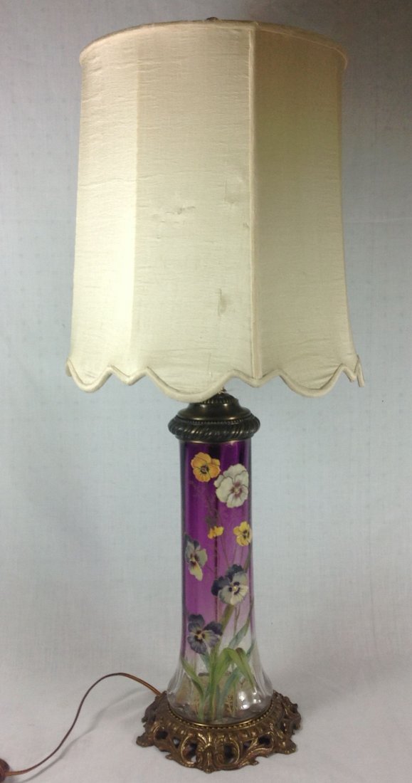 MOSER PURPLE TO CLEAR ENAMELED PANSY LAMP: The vase has a purple to clear body with gilt decoration and finely painted floral design. The lamp is 33" tall to top of lamp -- base of lamp is 17" tall.
