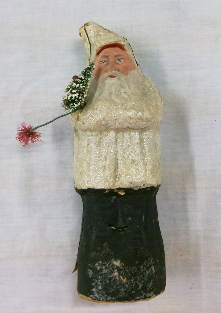 Tall Antique White Robed Mica Flecked Belsnickle Santa: Paper mache/composite Belsnickle in white robe. Red piping along hat, holds bottle brush trees, hand painted face, 8 1/2" tall