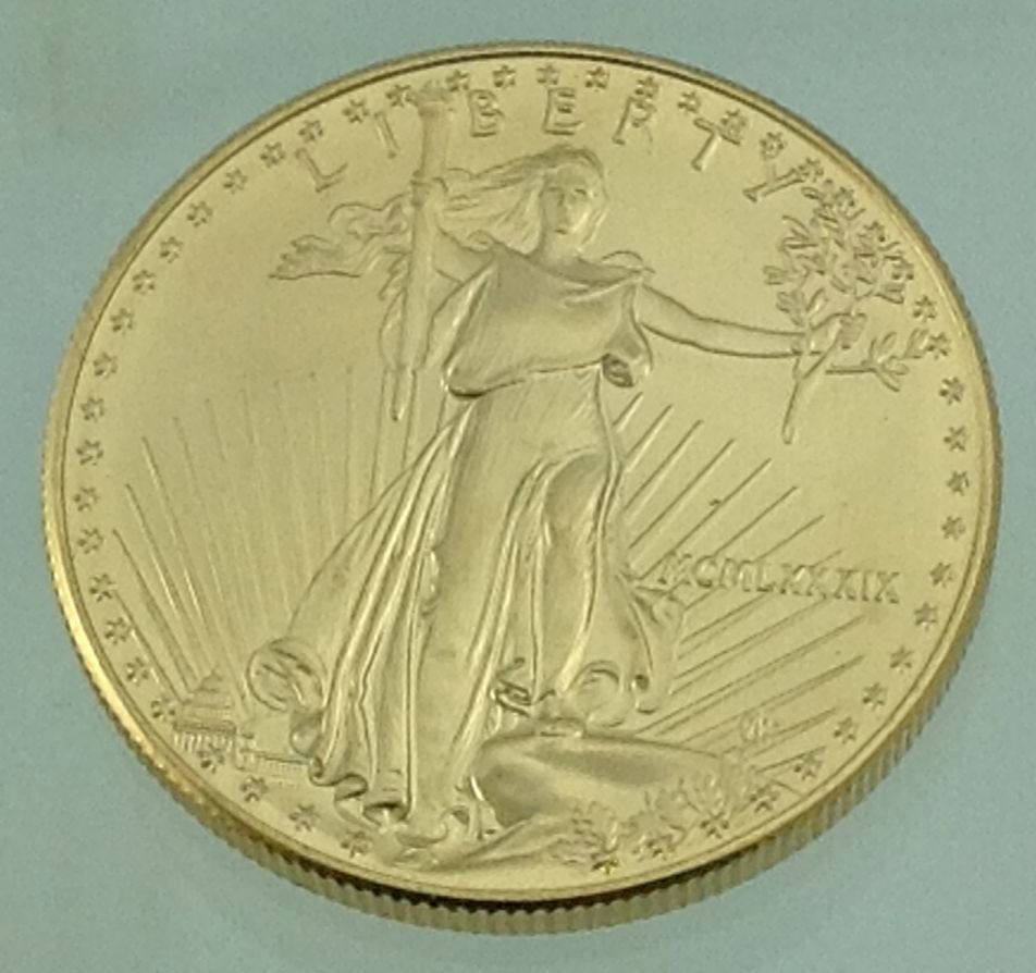1 American Gold Eagle $50 Coin 1 oz Fine Gold 1989: This is for 1 American Gold Eagle $50 coin. MCMLXXXIX or 1989 (we have 14 available in today\\\\\\\'s auction - please see lot numbers 177-190)Great for investors!