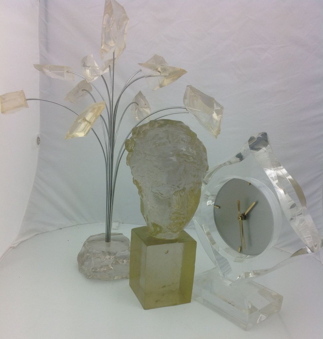 Group of 3 Lucite Sculptures incl Dorothy Thorpe Venus: Dorothy Thorpe Venus Bust solid lucite, 11"H x 4"W, Lucite Floral Arrangement w Chrome Stems, Lucite Quartz Clock