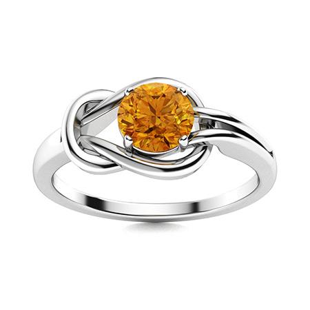 Natural 1.22 CTW Citrine Solitaire Ring 18K White Gold: Natural 1.22 CTW Citrine Solitaire Ring 18K White Gold Manufacturer's Suggested Retail Price: $1350.00 Center Stone: 1 Citrine @ 1.22 ctw Center Stone Color: Orange-brown Center Stone Clarity: AAAA Ce