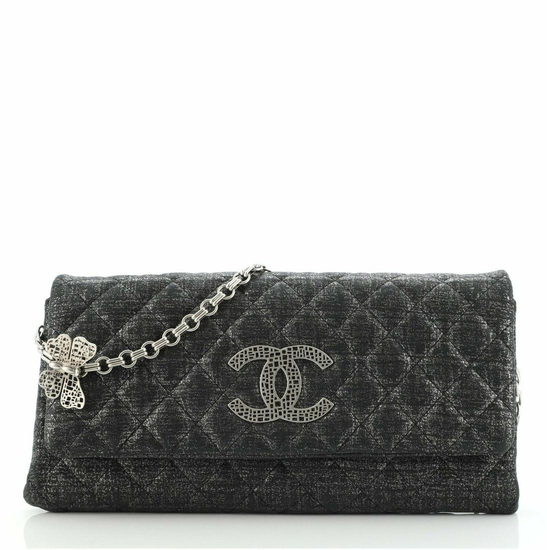 Chanel Butterfly Chain Clutch Quilted Glitter Fabric: Chanel Butterfly Chain Clutch Quilted Glitter Fabric Condition: Pre-owned: An item that has been used or worn previously. See the Consignor’s listing for full details and description of any imperfec