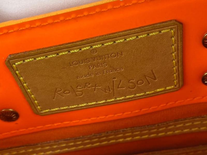 Louis Vuitton Rare Limited Robert Wilson Fluo Orange: Louis Vuitton Rare Limited Robert Wilson Fluo Orange Monogram Vernis Reade PM 10L19 Date/Authenticity Code: TH1002 Measurements: 9.5 L x 4 W x 7 H Exterior Pockets: None Interior Pockets: One flat poc