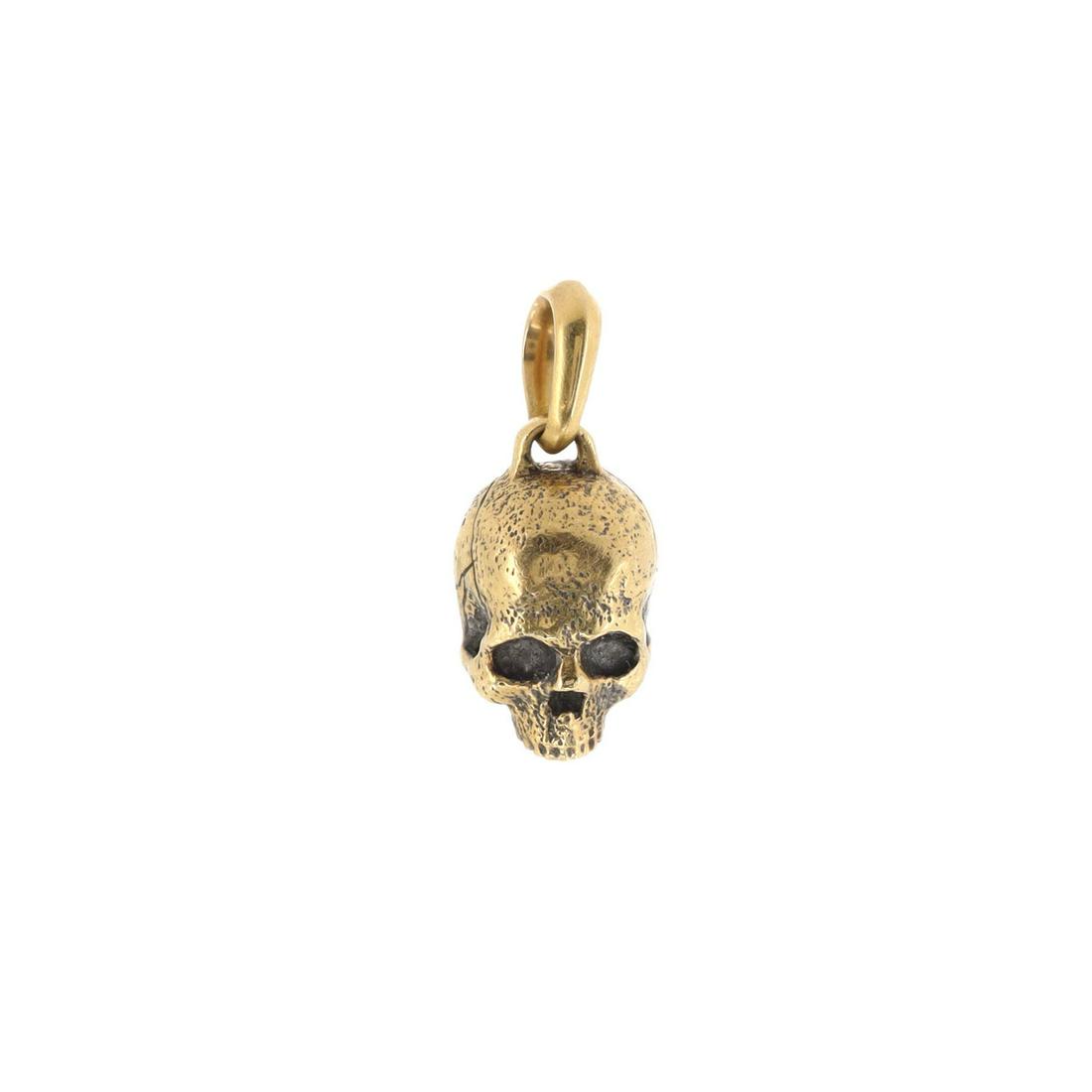 David Yurman Cable Classics Skull Pendant Pendant &: David Yurman Cable Classics Skull Pendant Pendant & Charms 18K Yellow Gold 9mm Metal Type: 18K Yellow Gold Metal Finish: Blackened, Matte Finish Hallmarks Type: 750 Signature / Hallmark Location: On B