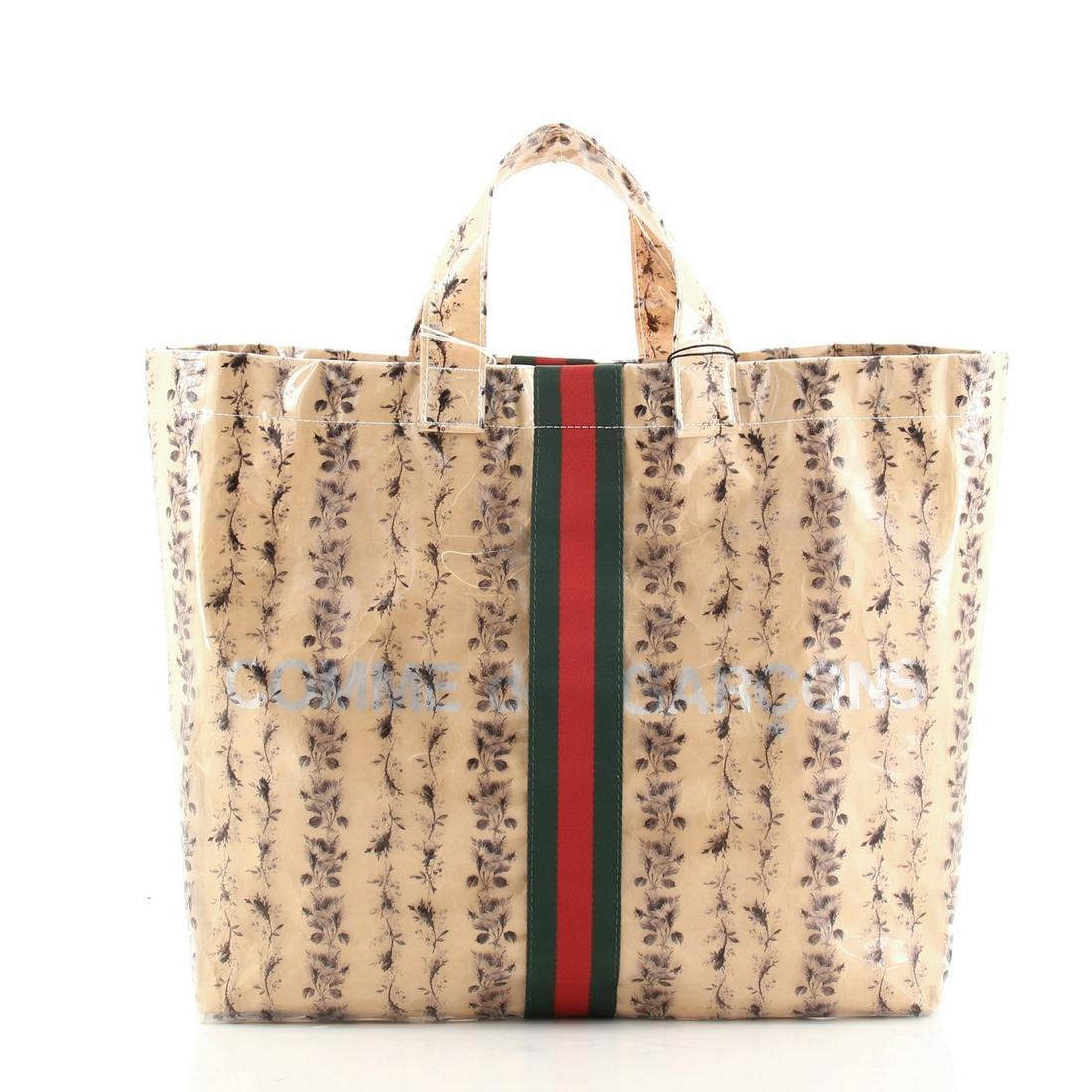Gucci Comme de Garcons Web Shopping Tote Printed PVC and Paper Medium: Gucci Comme de Garcons Web Shopping Tote Printed PVC and Paper Medium Exterior Color: Brown, Print Interior Color: Neutral Exterior Material: Pvc, Paper Interior Material: Canvas Interior Accessories: