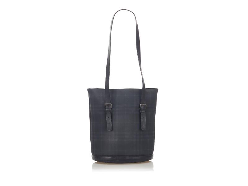 Tonal Check Tote Bag: Tonal Check Tote Bag SKU: RBJ1DBUTO010 Brand: Burberry Condition: Pre-Owned This tote bag features a PVC body with leather trim, flat leather handles, a top zip closure, and interior zip and slip pock