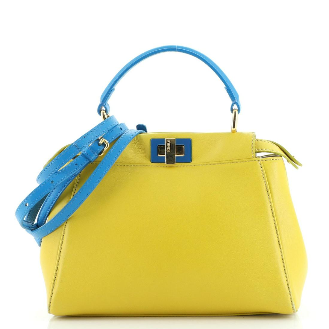 Fendi Peekaboo Bag Leather Mini: Fendi Peekaboo Bag Leather Mini Exterior Color: Yellow Interior Color: Neutral Exterior Material: Leather Interior Material: Leather Hardware Color: Gold Accessories: Dust bag, Detachable Strap