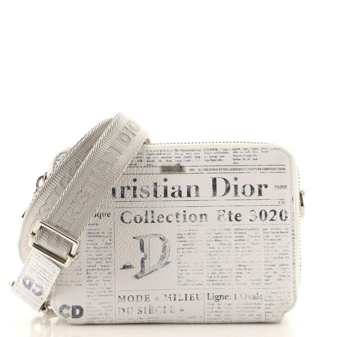 Christian Dior Daniel Arsham Double Zip Crossbody Pouch Newspaper Print Leather: Christian Dior Daniel Arsham Double Zip Crossbody Pouch Newspaper Print Leather Exterior Color: Neutral, Print Interior Color: Black Exterior Material: Leather Interior Material: Fabric Hardware Color