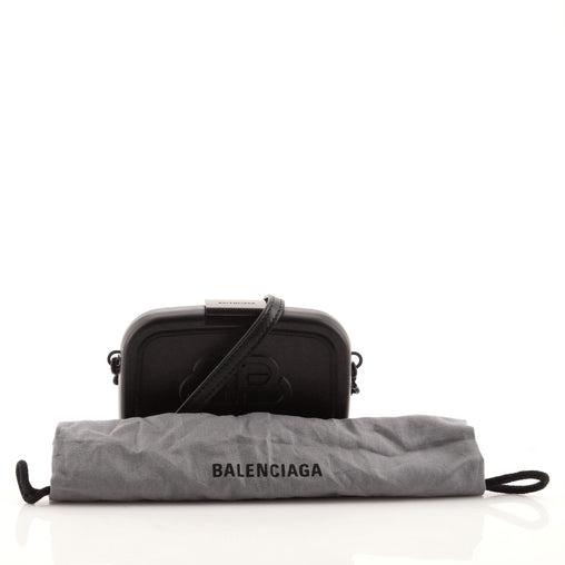 Balenciaga Logo Lunch Box Bag Plastic: Balenciaga Logo Lunch Box Bag Plastic Exterior Color: Black Interior Color: Black Exterior Material: Resin Interior Material: Leather Hardware Color: Black, Matte Accessories: Dust bag, Detachable
