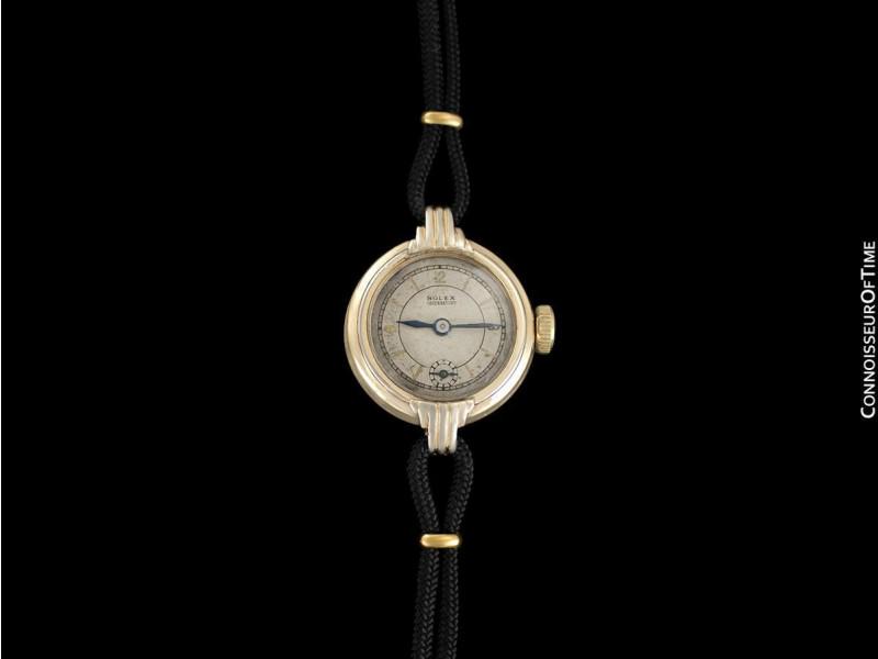 1930'S ROLEX OBSERVATORY Vintage Ladies Gold Watch: 1930'S ROLEX OBSERVATORY Vintage Ladies Gold Watch 1930's ROLEX OBSERVATORY Vintage Ladies Gold WatchItem Specifics:Band Color: BlackBand Material: Black CordBezel Color: GoldBrand: RolexCase Color: G