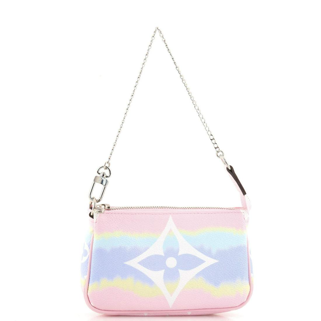 Louis Vuitton Pochette Accessoires Limited Edition Escale Monogram Giant Mini: Louis Vuitton Pochette Accessoires Limited Edition Escale Monogram Giant Mini Exterior Color: Pink, Multi Color Interior Color: Purple Exterior Material: Canvas Coated Interior Material: Fabric Hardwa