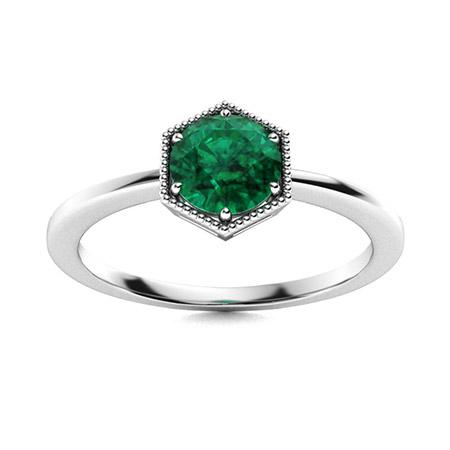 Natural 0.77 CTW Emerald Solitaire Ring 18K White Gold: Natural 0.77 CTW Emerald Solitaire Ring 18K White Gold Manufacturer's Suggested Retail Price: $4380.00 Center Stone: 1 Emerald @ 0.77 ctw Center Stone Color: Green Center Stone Clarity: AAAA Center St