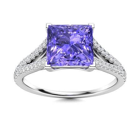 Natural 0.92 CTW Tanzanite & Diamond Engagement Ring 18K White Gold: Natural 0.92 CTW Tanzanite & Diamond Engagement Ring 18K White Gold Manufacturer's Suggested Retail Price: $3480.00 Center Stone: 1 Tanzanite @ 0.62 ctw Center Stone Color: Royal blue Center Stone Cla