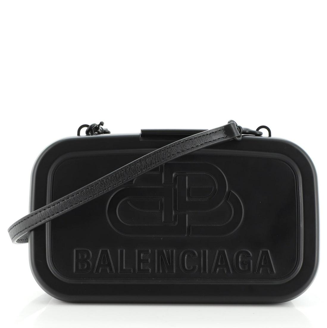 Balenciaga Logo Lunch Box Bag Plastic: Balenciaga Logo Lunch Box Bag Plastic Exterior Color: Black Interior Color: Black Exterior Material: Resin Interior Material: Leather Hardware Color: Black Accessories: Dust bag, Detachable Strap