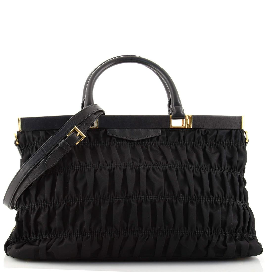 Prada Gaufre Convertible Frame Bag Tessuto and Nappa Leather Medium: Prada Gaufre Convertible Frame Bag Tessuto and Nappa Leather Medium Exterior Color: Black Interior Color: Black Exterior Material: Leather, Nylon Interior Material: Fabric Hardware Color: Gold Acc
