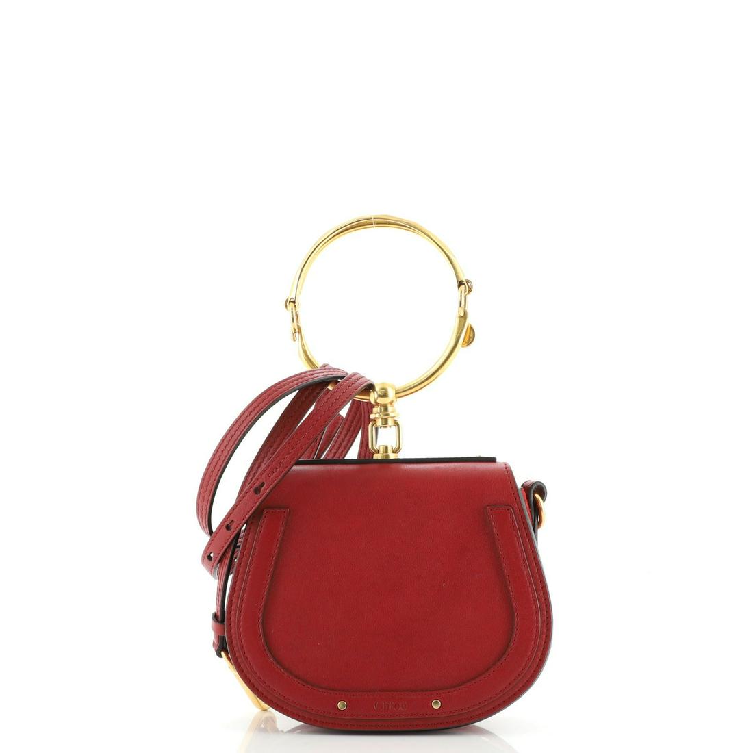 Chloe Nile Crossbody Bag Leather Small: Chloe Nile Crossbody Bag Leather Small Exterior Color: Red Interior Color: Neutral Exterior Material: Leather Interior Material: Suede Hardware Color: Gold Accessories: Dust bag, Detachable Strap
