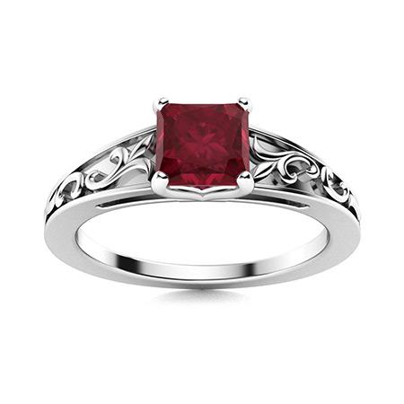 Natural 0.67 CTW Ruby Solitaire Ring 18K White Gold: Natural 0.67 CTW Ruby Solitaire Ring 18K White Gold Manufacturer's Suggested Retail Price: $4230.00 Center Stone: 1 Ruby @ 0.67 ctw Center Stone Color: Red Center Stone Clarity: AAAA Center Stone Shap