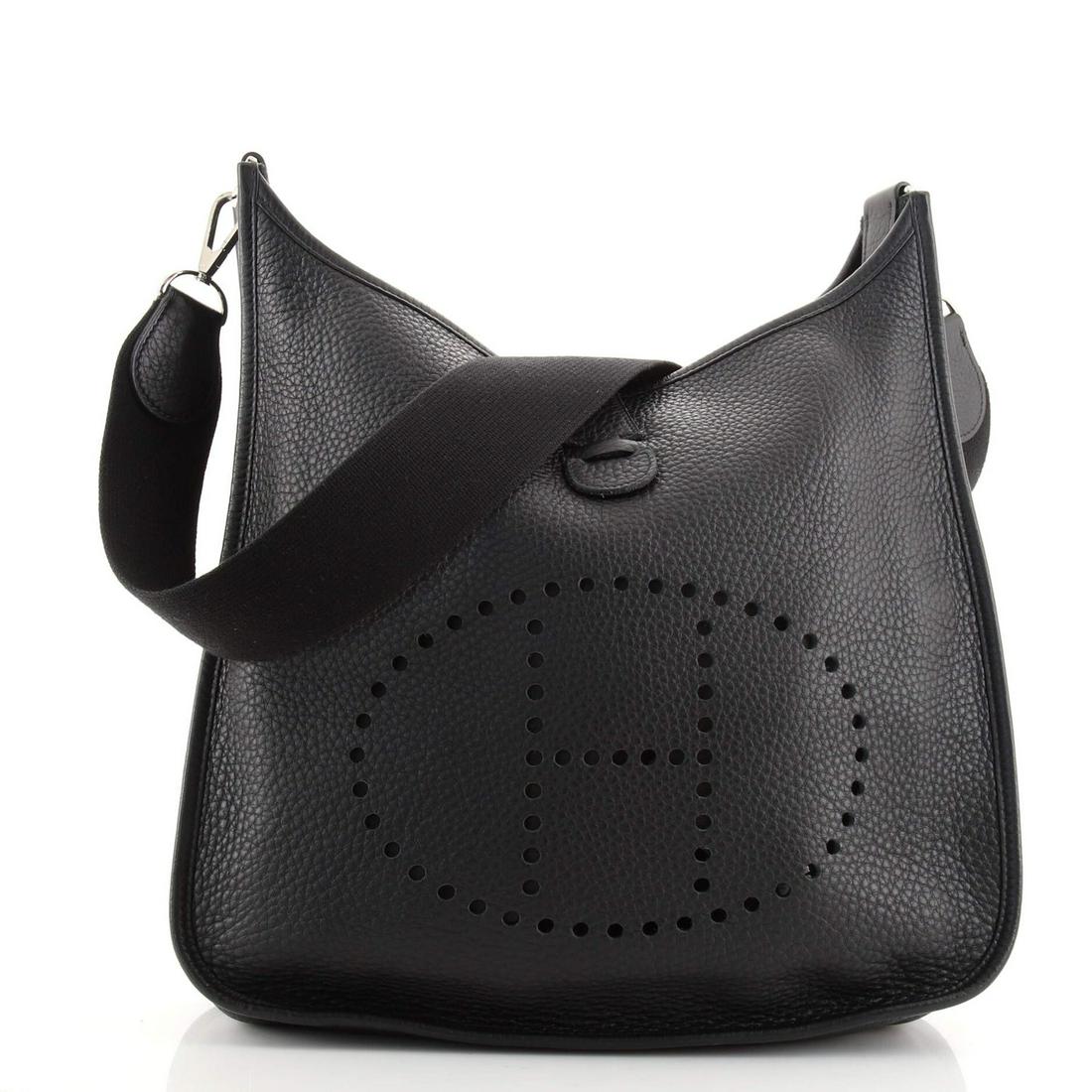 Hermes Evelyne Bag Gen I Fjord PM: Hermes Evelyne Bag Gen I Fjord PM Exterior Color: Black Interior Color: Black Exterior Material: Leather Interior Material: Raw Leather Hardware Color: Palladium Accessories: Detachable Strap