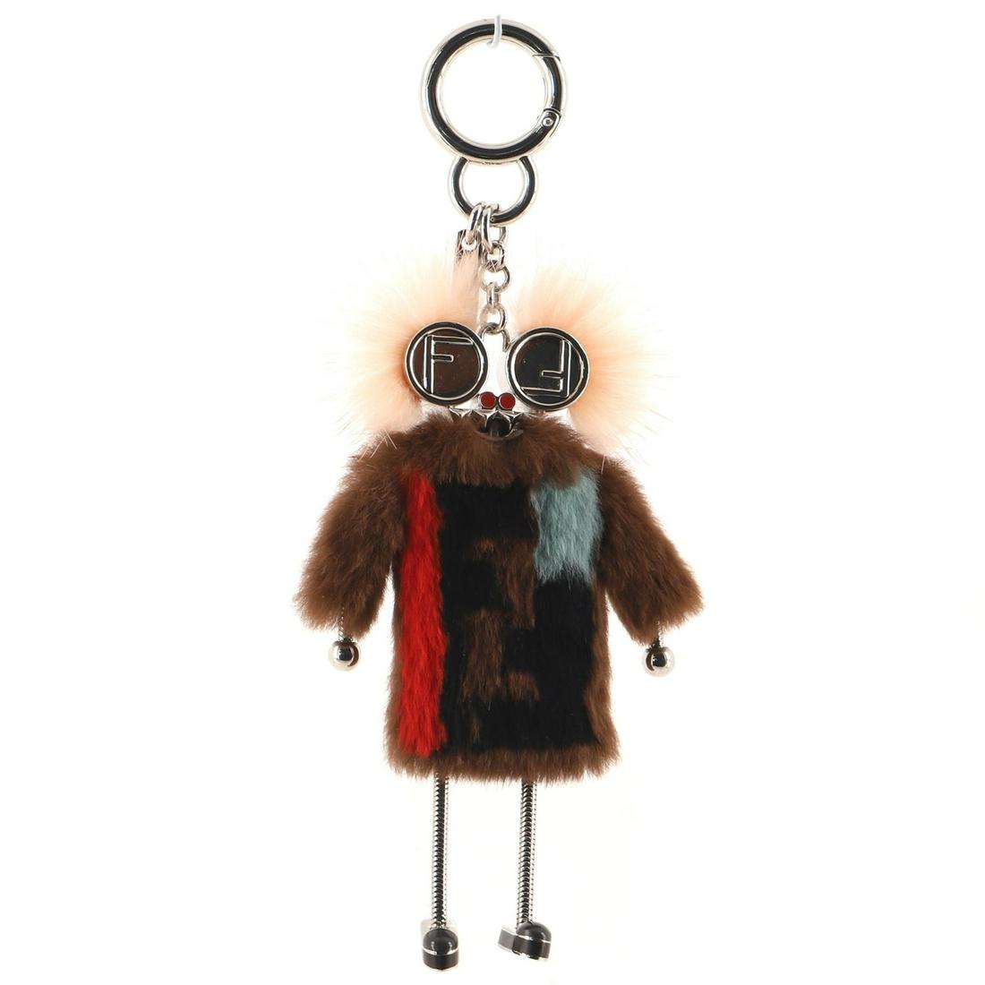 Fendi Teen Witch Bag Charm Fur with Metal: Fendi Teen Witch Bag Charm Fur with Metal Exterior Color: Multicolor Exterior Material: Fur, Metal Accessories: No accessories SKU: CS.FE.TECM.FUMT Item No: 180224/4 SIZE AND FIT: 4"W x 6.5"H