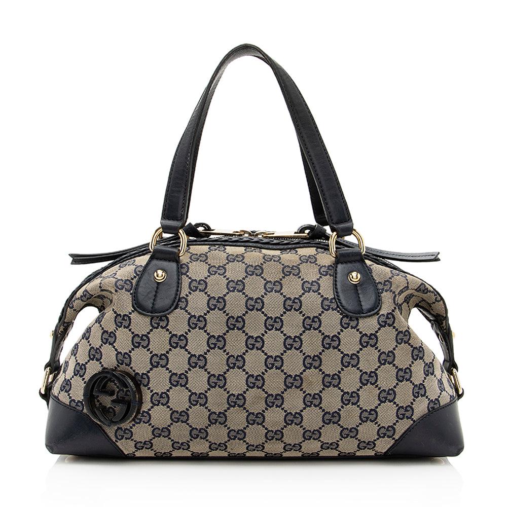 Gucci GG Canvas Brick Lane Boston Bag: Gucci GG Canvas Brick Lane Boston Bag Condition Quality: Fair Color: Blue Height: 8 in. Length: 13 in. Material: Canvas/Leather Width: 5 in. Item Condition: Pre Owned SKU: SHF-19