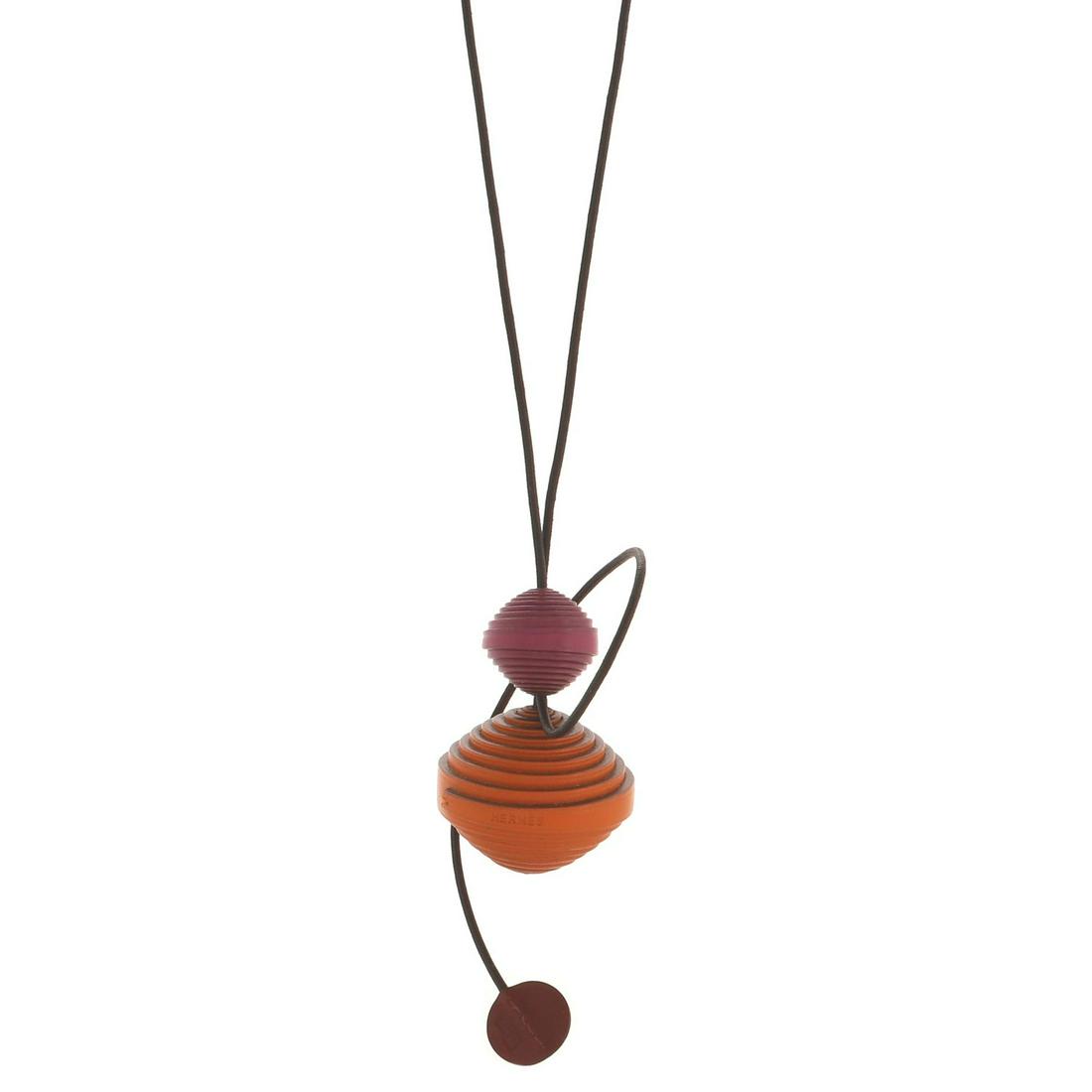 Hermes Spiral Pendant Long Necklace Leather: Hermes Spiral Pendant Long Necklace Leather Exterior Color: Multicolor Material: Leather Item No: 166997/131 Brand Code: I Square (2005) SIZE AND FIT: Length: 15 ", Pendant Length: 3 ", Pendant W
