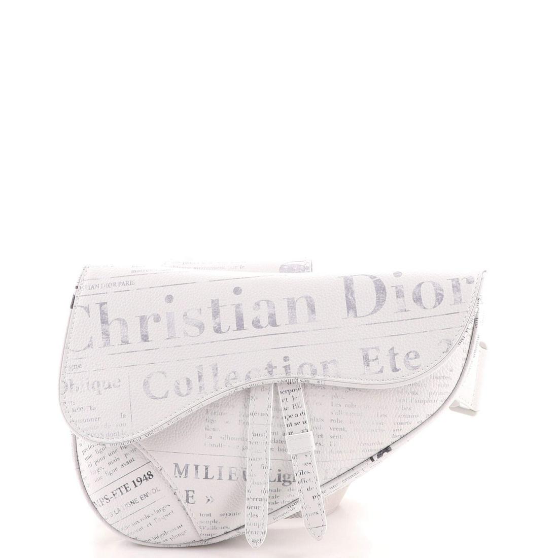 Christian Dior Daniel Arsham Saddle Crossbody Bag Printed Leather: Christian Dior Daniel Arsham Saddle Crossbody Bag Printed Leather Exterior Color: Gray Interior Color: Black Exterior Material: Leather Interior Material: Nylon Hardware Color: Silver Accessories: