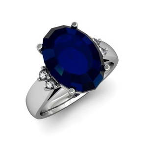 Sapphire 7.25 ctw & Diamond Ring 14kt White Gold: Sapphire 7.25 ctw & Diamond Ring 14kt White Gold **|**|** Mainstone: Sapphire ; Total CTW: 7.25 ; Shape: Oval ; Gem Size: 14x10mm ; Metal / Purity: 14kt White Gold ; MSRP: $2800