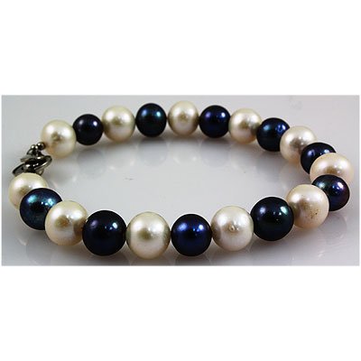 92.91ctw Philippines 8-9mm Mikimoto Pearl Bracelet: 92.91ctw Philippines 8-9mm Mikimoto Pearl Bracelet **|**|** Hand picked and assembled Mikimoto cultured pearl 8.0" Bracelet. Silk/Nylon thread with Sterling Silver clasps. ; MSRP: $200