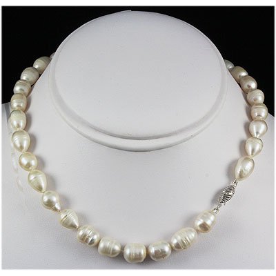 199.33ctw Freshwater Pearl Necklace w/ 14KWG Clasp: 199.33ctw Freshwater Pearl Necklace w/ 14KWG Clasp **|**|** Handknotted White Fresh Water Pearl Necklace 16" long. Silk/Nylon thread with 14K White Gold Clasp closure. ; MSRP: $300