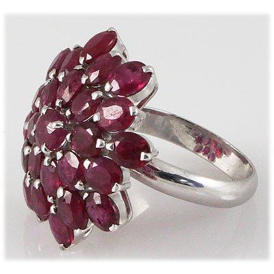 Ruby 15.00 ctw Flower Design Ring 0.925 Silver: Ruby 15.00 ctw Flower Design Oval Cut Ring 0.925 Silver **|**|** Mainstone: Ruby ; CTW: 15.00 ; Shape: Oval cut ; Gem Size: 6x4mm ; Metal / Purity: 0.925 Sterling Silver ; Grams: 7.12 ; MSRP: $100