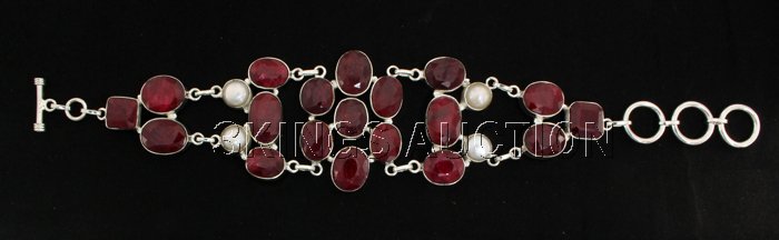 Fashion Silver 275.70ctw Ruby Beryl Bracelet: Fashion Silver 275.70ctw Ruby Beryl Bracelet **|**|** Heavy Cut Mix Petite Size Ruby Gemstone in Handmade Silver Bracelet w/ Pearls size: 8.5 inches; color: Red; Stone Family: Beryl ; MSRP: $600